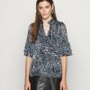 Wholesale Michael Michael Kors Zebra Ruffle Bell Blouse Chambray